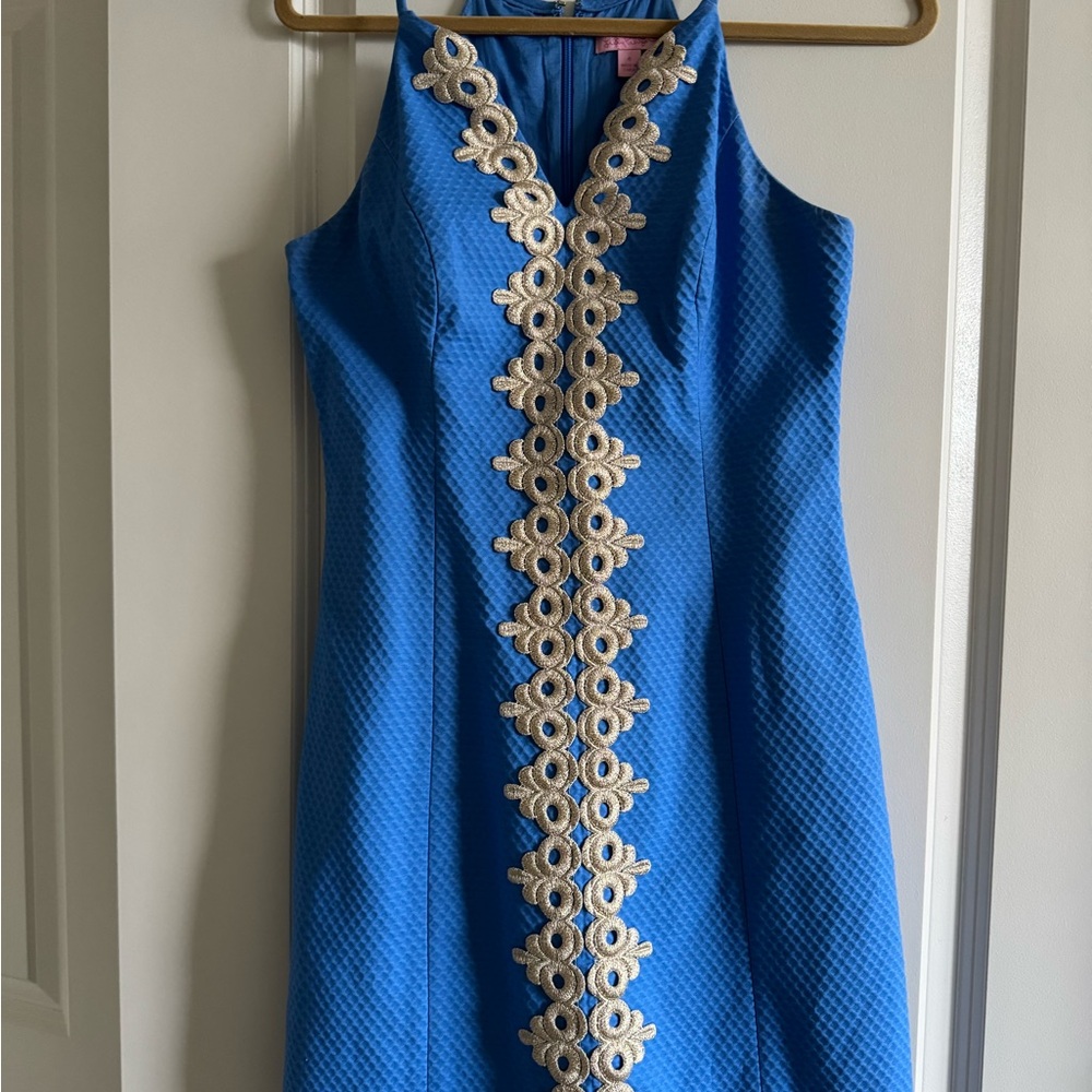 Elegant Blue Dress with Intricate Detailing